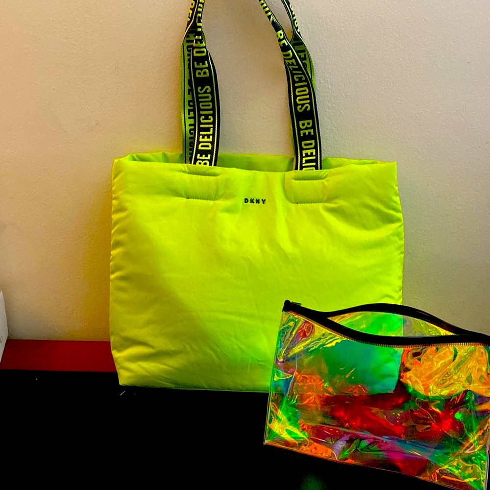 New nylon DKNY nylon tote. Fits over shoulder. Comes with reflective pouch